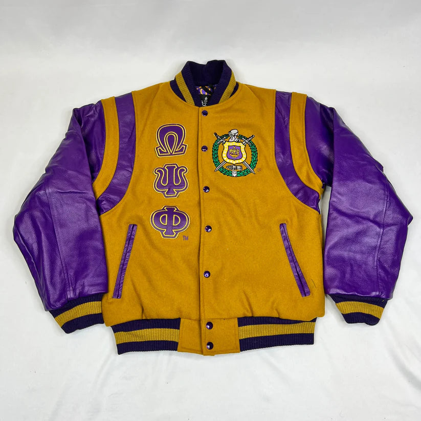 Yellow and purple letterman jacket with Omega Psi Phi symbols on a white background