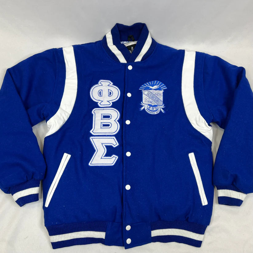 Blue varsity jacket with white lettering and emblem on a light gray background