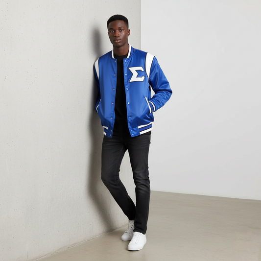 The Phi Beta Sigma Bomber Jacket in the classic white and blue colorway. The image highlights the smooth, glossy finish of the premium satin material and the ribbed cuffs and collar of the classic bomber silhouette.