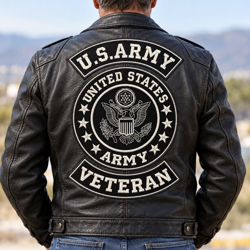 Rear view of a model wearing white-on-black U.S. Army Veteran patches on a black leather biker jacket.