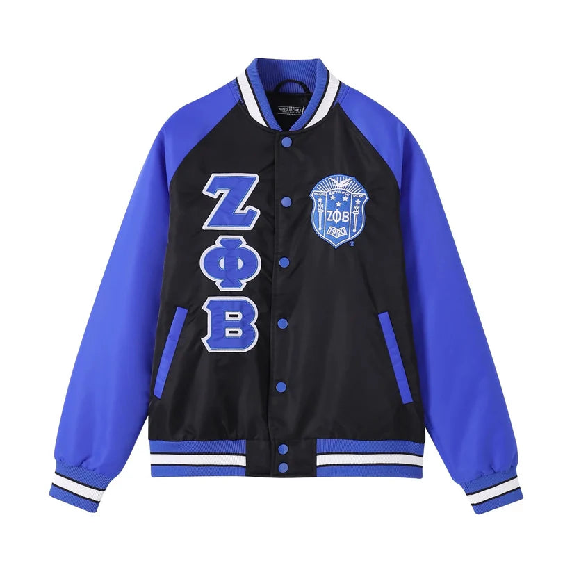 A close-up of the Black Zeta Bomber Jacket, showing the smooth, lightweight nylon material and the high-quality embroidered appliqué logo on the chest.