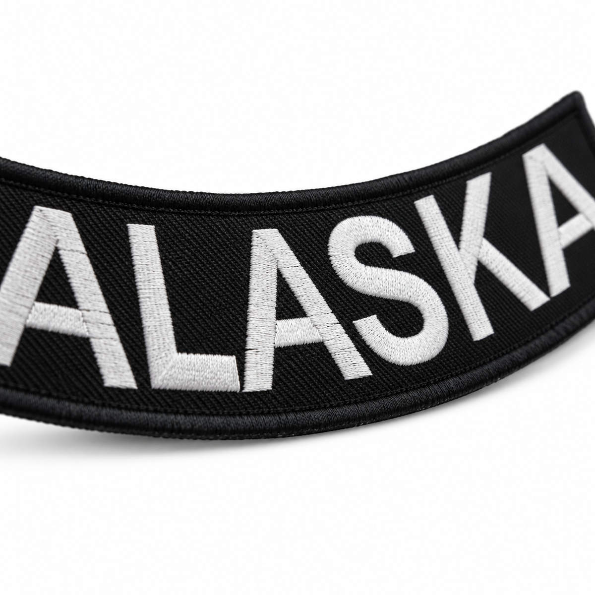 Alaska Bottom Rocker Patch - White on Black Iron On Sew On Large Back Patch for Biker Vest Jacket — embroidered thread close-up
