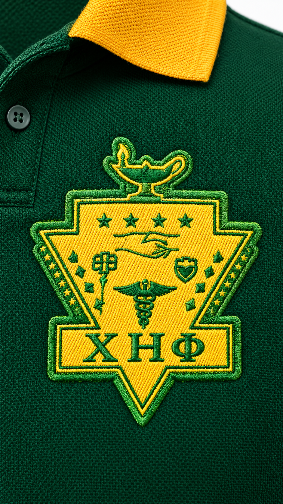 Three-quarter front view of Chi Eta Phi green polo with gold collar, embroidered crest and 1932 sleeve