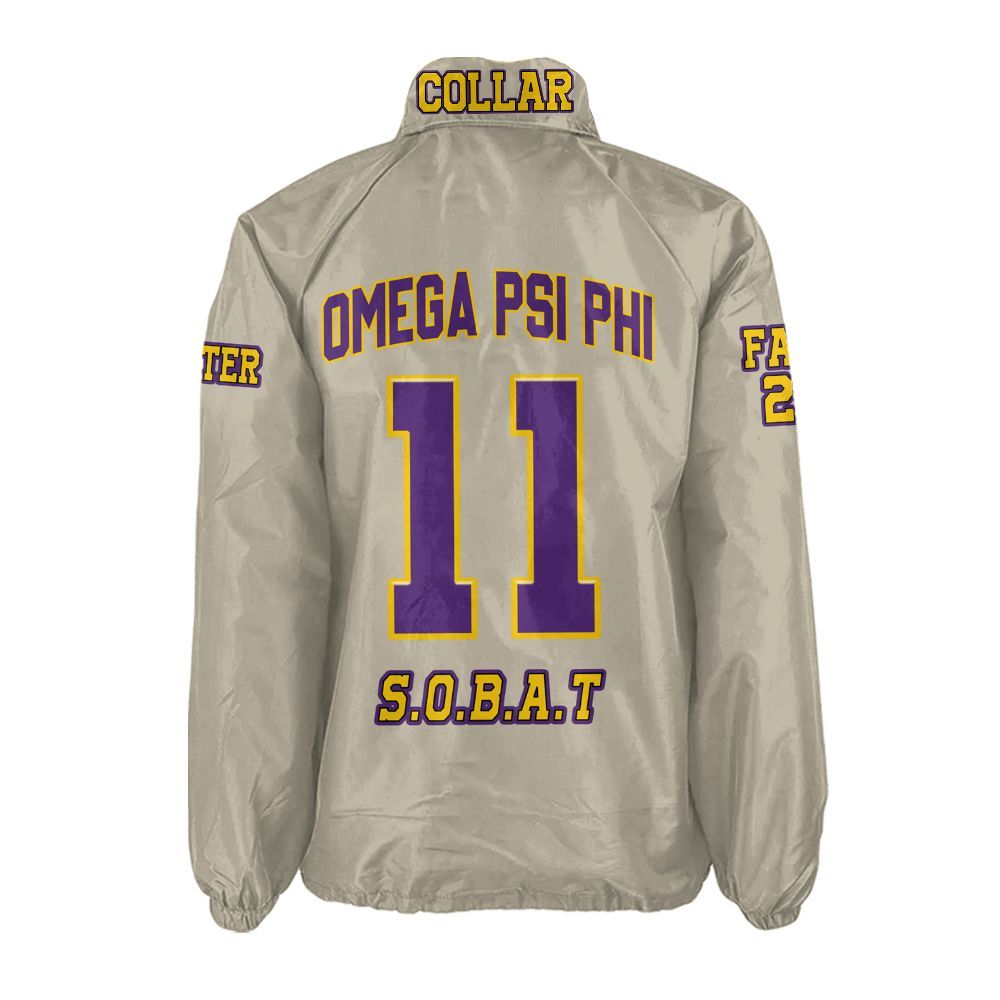 Omega Psi Phi Beige Coach Jacket – Custom Embroidered "Que" Crossing Jacket