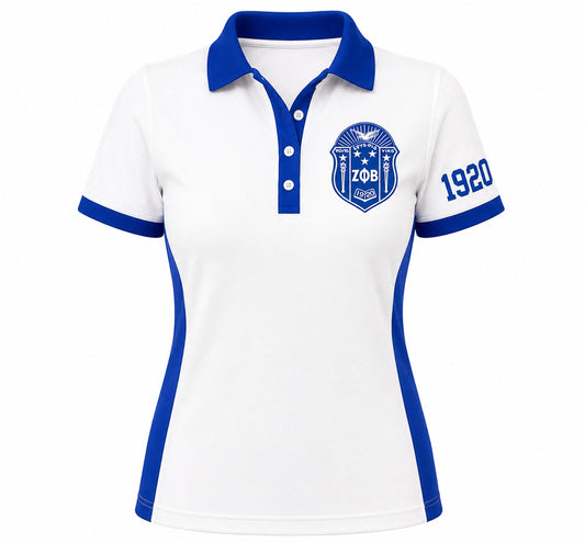 White short-sleeve polo shirt with royal blue collar, placket, sleeve trim, and side panels. Features a blue ZOB crest on the left chest and '1920' printed in blue on the right sleeve, shown on a plain white background.